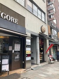 メロンパン屋さんが目印のビル6階です。 - BasisPoint 神保町店  千代田区神田神保町エリア8名用会議室 (Room B)の入口の写真